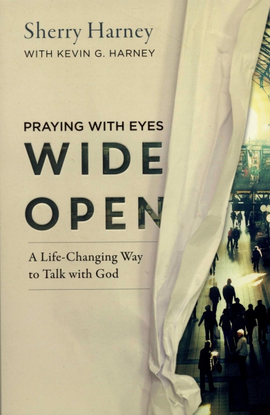 Praying with eyes wide open